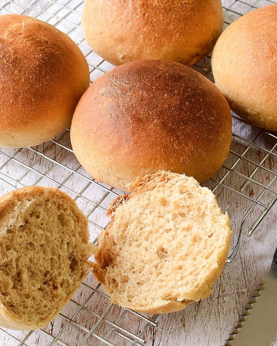 Freshly baked hamburger buns with hot dog and breadstick options