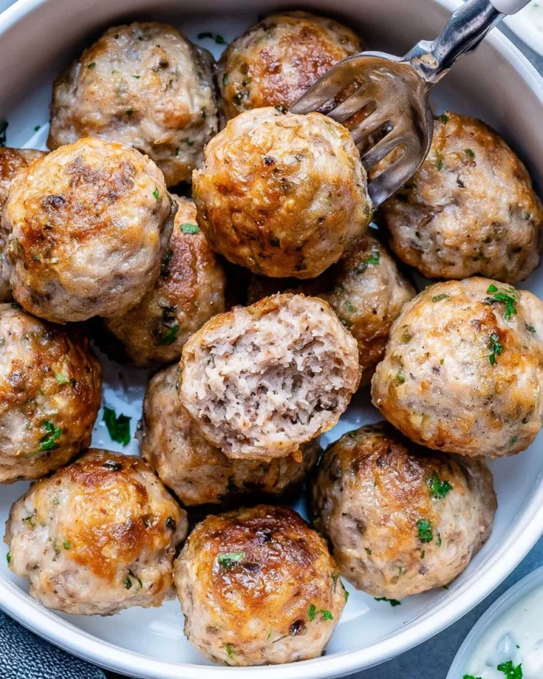 Crispy air fryer meatballs served on a plate with dipping sauce